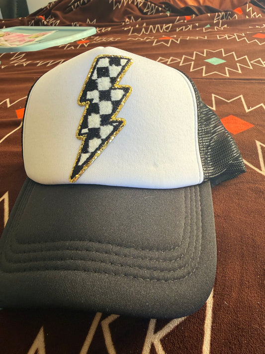 Checkered lightening blot trucker hat